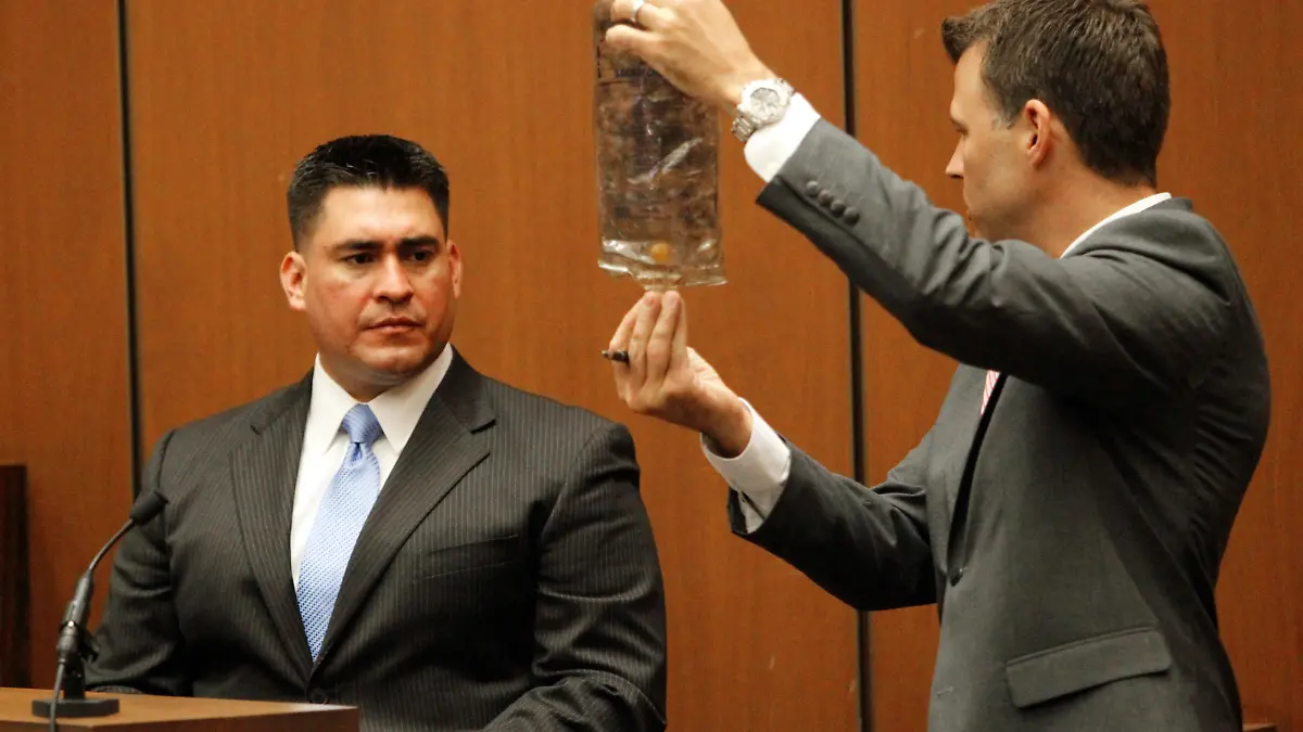 3rd day of the Conrad Murray trial in Los Angeles. Alberto Alvarez, one of Michael Jackson's security guards, took the stand in the Conrad Murray involuntary manslaughter trial in downtown Los Angeles, September 29, 2011. Deputy District Attorney, David Walgren, holding a bottle of propofol, questions Alvarez on the events of June 25, 2009.