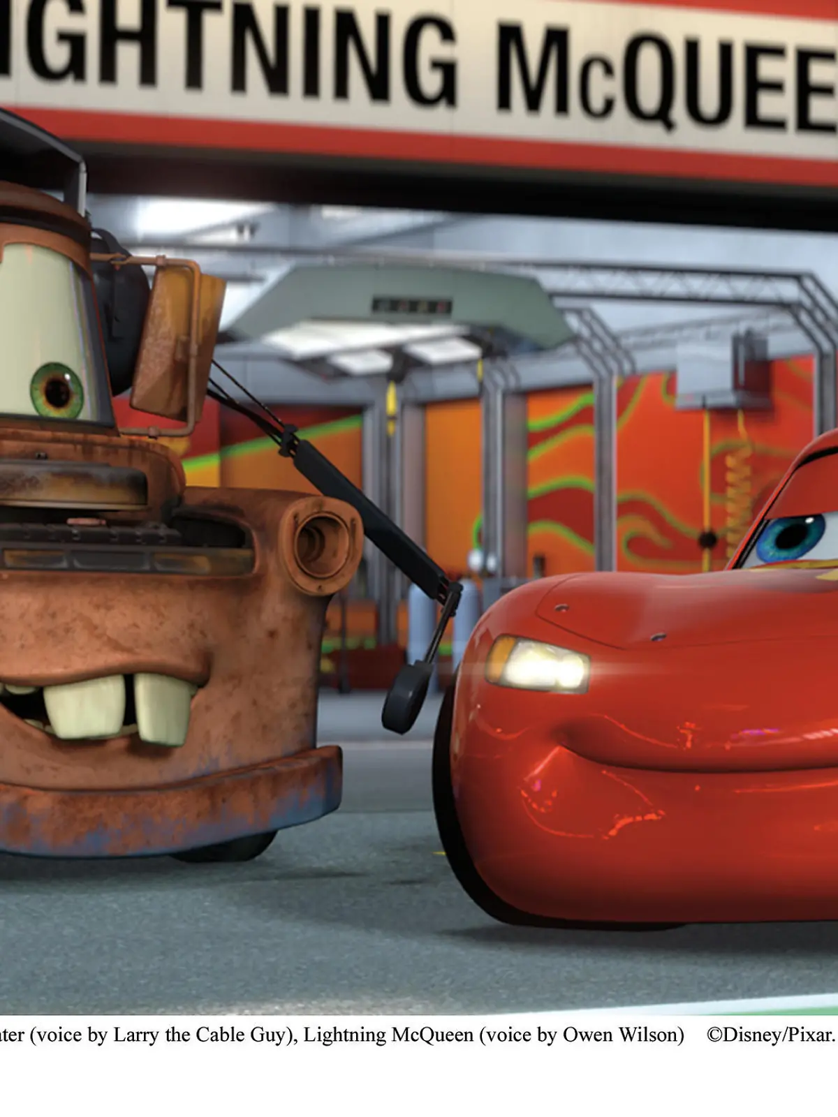 "CARS 2"(L-R) Mater (voice by Larry the Cable Guy), Lightning McQueen (voice by Owen Wilson)Â©Disney/Pixar.  All Rights Reserved.