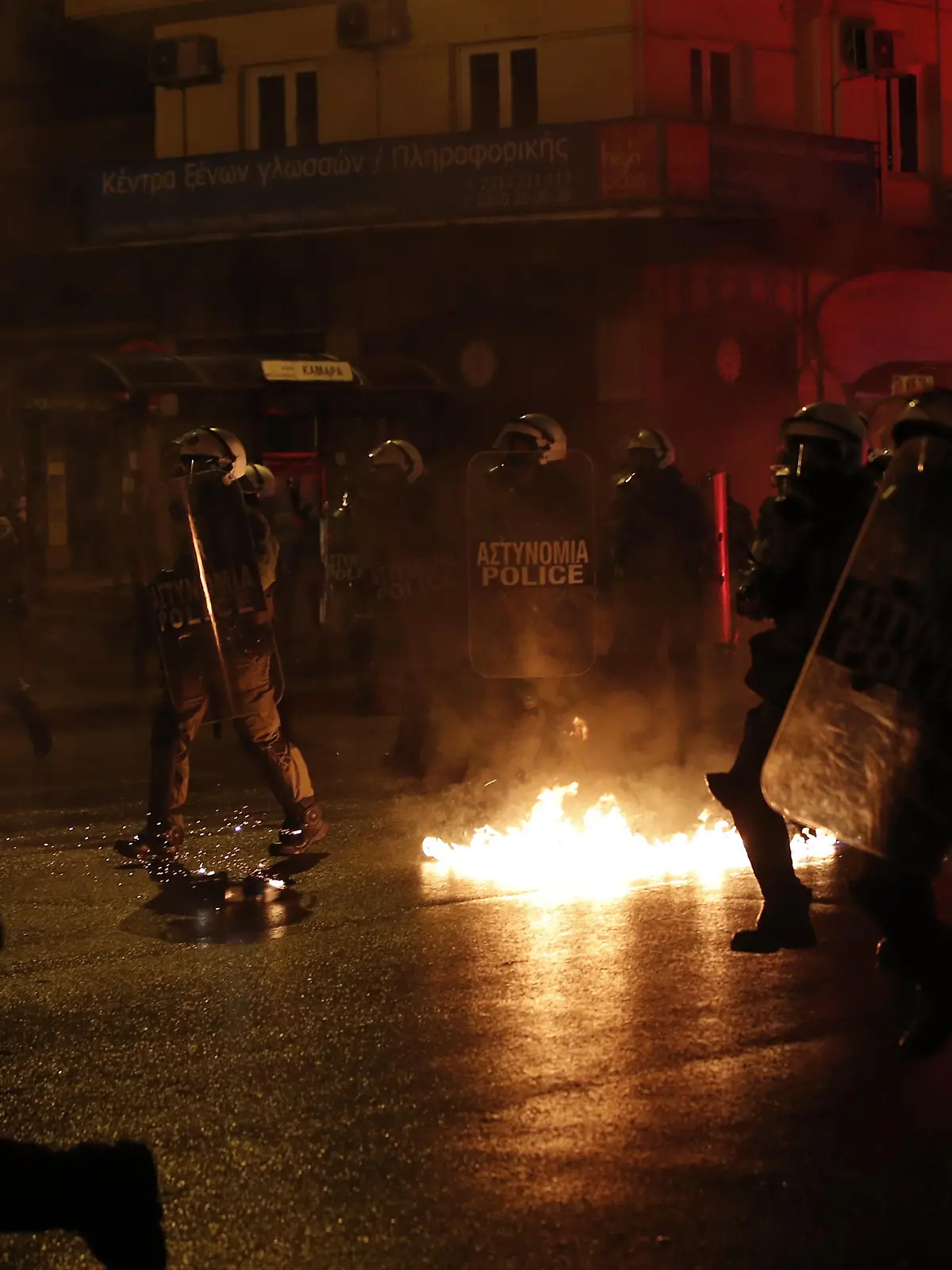 THESSALONIKI, GREECE - DECEMBER 06: Clashes erupt between police and demonstrators during a rally in Thessaloniki, Greece on December 6, 2021 to protest against police repression, marking the police killing of a teenager back in 2008. - The police killing of 15-year-old Alexandros Grigoropoulos sparked a month of rioting across Greece in 2008. Dimitris Kapantais / Anadolu Agency
