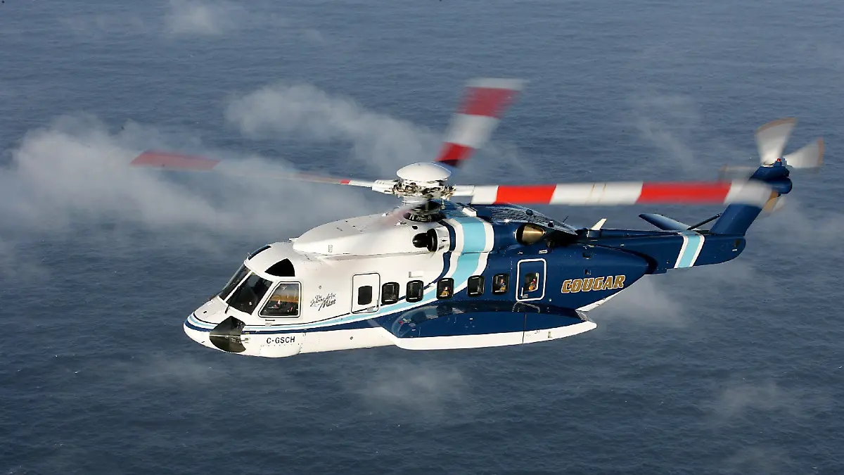 (FILES) An undated handout photo from Cougar Helicopters shows a Sikorsky S-92 helicopter similar to the one that crashed off the coast of Newfoundland, Canada, 12 March 2009. The helicopter, carrying 18 people headed to two offshore oilfields, crashed and sank in the Atlantic Ocean. According to reports, two life rafts were spotted by rescue crews near the scene of the crash and one person has been rescued from the water. The helicopter, referred to as Cougar 911, sank after the crash. EPA/MIKE REYNO / COUGAR HELICOPTERS HANDOUT EDITORIAL USE ONLY, NO SALES EDITORIAL USE ONLY +++(c) dpa - Bildfunk+++