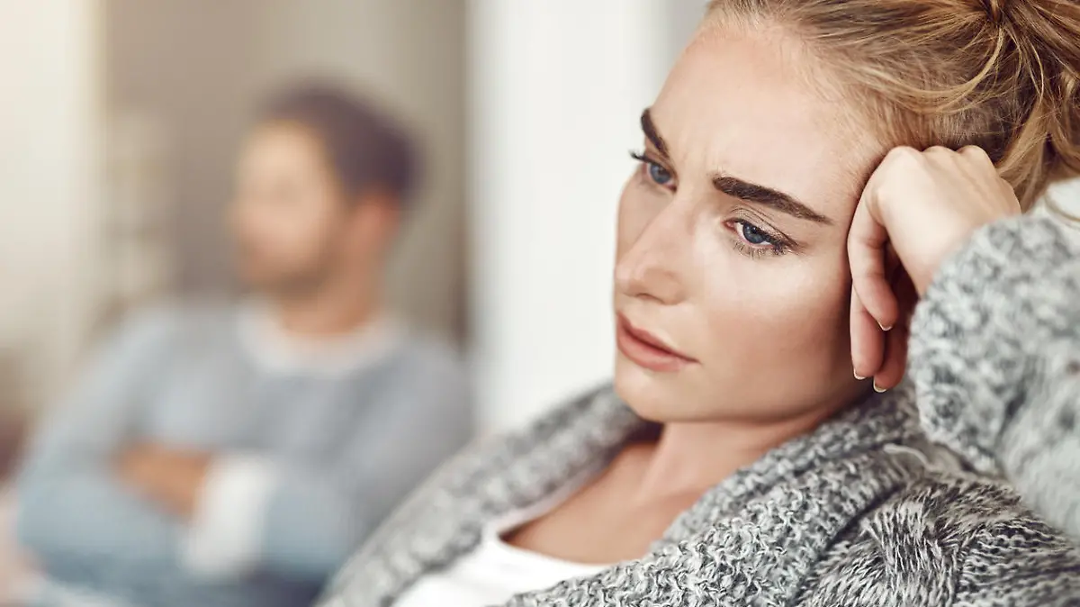 Cropped shot of an unhappy young couple after a fight at home