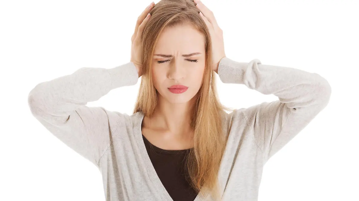 Beautiful casual woman is covering her ears. Isolated on white.