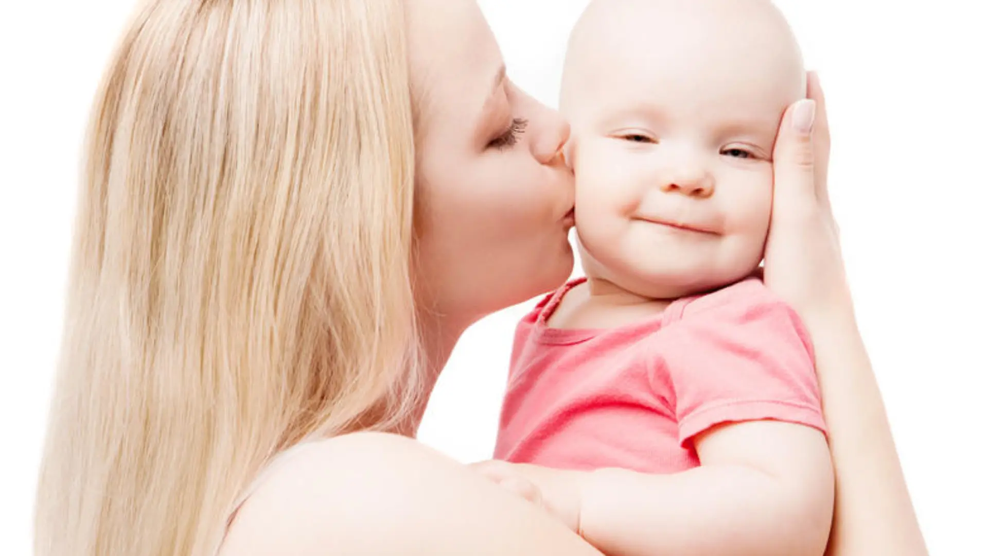 young mother kissing her baby, isolated on white background