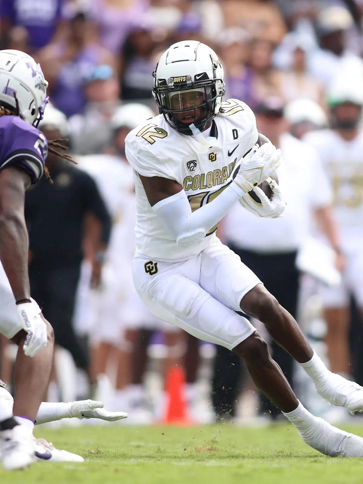 Sep 2, 2023; Fort Worth, Texas, USA; Colorado Buffaloes wide receiver Travis Hunter (12) runs after catching a ball in the first half against the TCU Horned Frogs at Amon G. Carter Stadium. Mandatory Credit: Tim Heitman-USA TODAY Sports