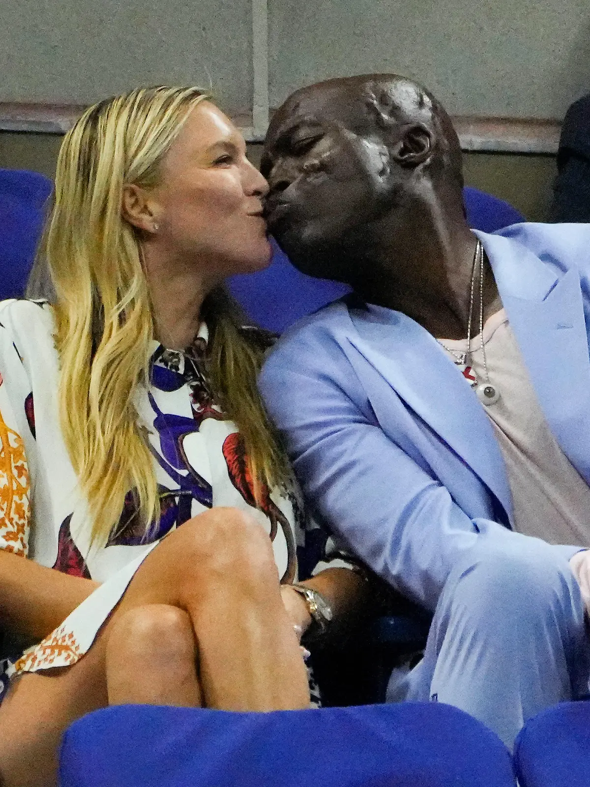 Sept 2, 2023; Flushing, NY, USA; Recording artist Seal kisses his date Laura Strayer during the night session match on day six of the 2023 U.S. Open tennis tournament at USTA Billie Jean King National Tennis Center. Mandatory Credit: Robert Deutsch-USA TODAY Sports