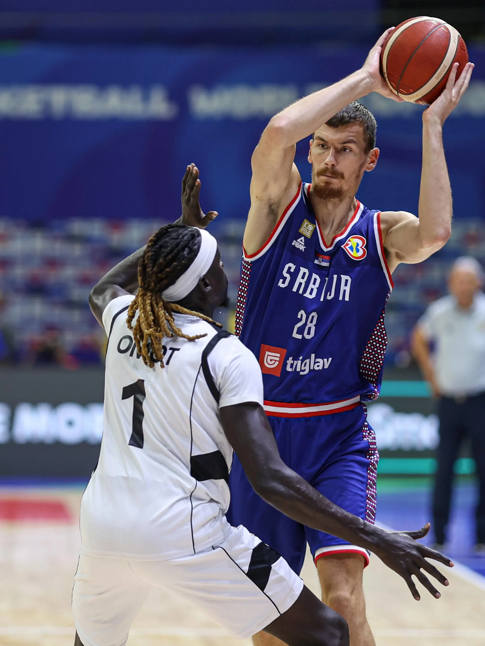 MANILA, PHILIPPINES - AUGUST 30: Borisa Simanic 28 of Serbia drives the ball against Nuni Omot 1 of South Sudan during the first round Group B match between South Sudan and Serbia on day 6 of the FIBA Basketball World Cup at Araneta Coliseum on August 30, 2023 in Manila, Philippines. PUBLICATIONxNOTxINxCHN Copyright: xVCGx 111451745104