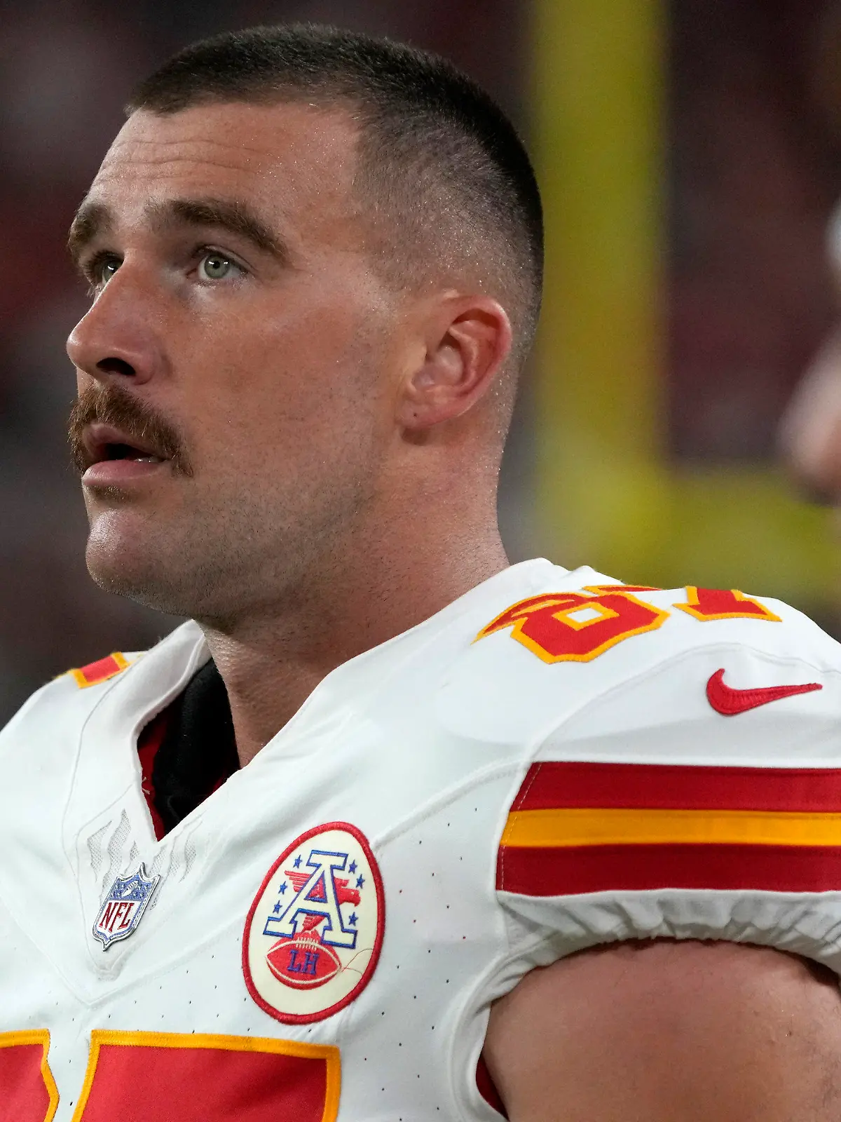 Kansas City Chiefs tight end Travis Kelce watches from the sidelines during the first half of an NFL preseason football game against the Arizona Cardinals, Saturday, Aug. 19, 2023, in Glendale, Ariz. (AP Photo/Rick Scuteri)