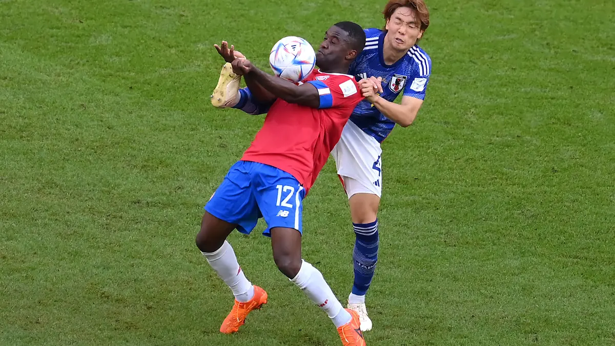 DOHA, QATAR - NOVEMBER 27: Joel Campbell of Costa Rica battles for possession with Kou Itakura of Japan during the FIFA World Cup Qatar 2022 Group E match between Japan and Costa Rica at Ahmad Bin Ali Stadium on November 27, 2022 in Doha, Qatar. (Photo by Justin Setterfield/Getty Images)