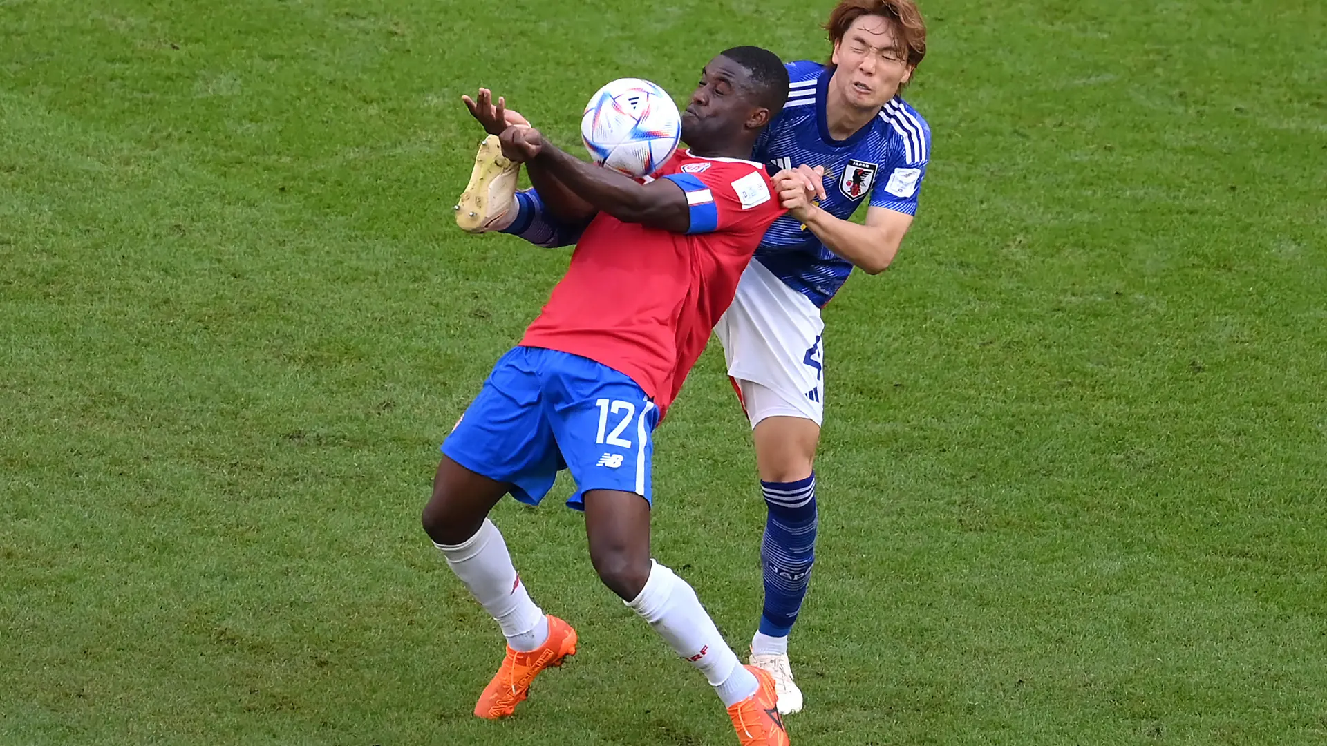 DOHA, QATAR - NOVEMBER 27: Joel Campbell of Costa Rica battles for possession with Kou Itakura of Japan during the FIFA World Cup Qatar 2022 Group E match between Japan and Costa Rica at Ahmad Bin Ali Stadium on November 27, 2022 in Doha, Qatar. (Photo by Justin Setterfield/Getty Images)