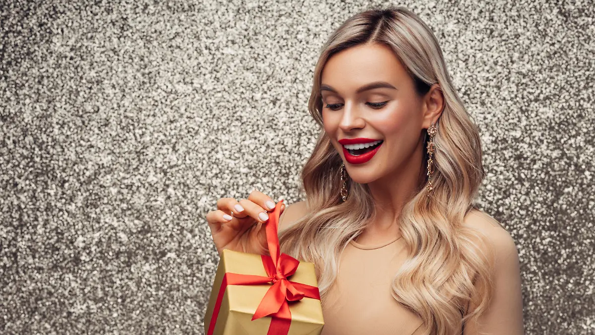 Beautiful woman with present