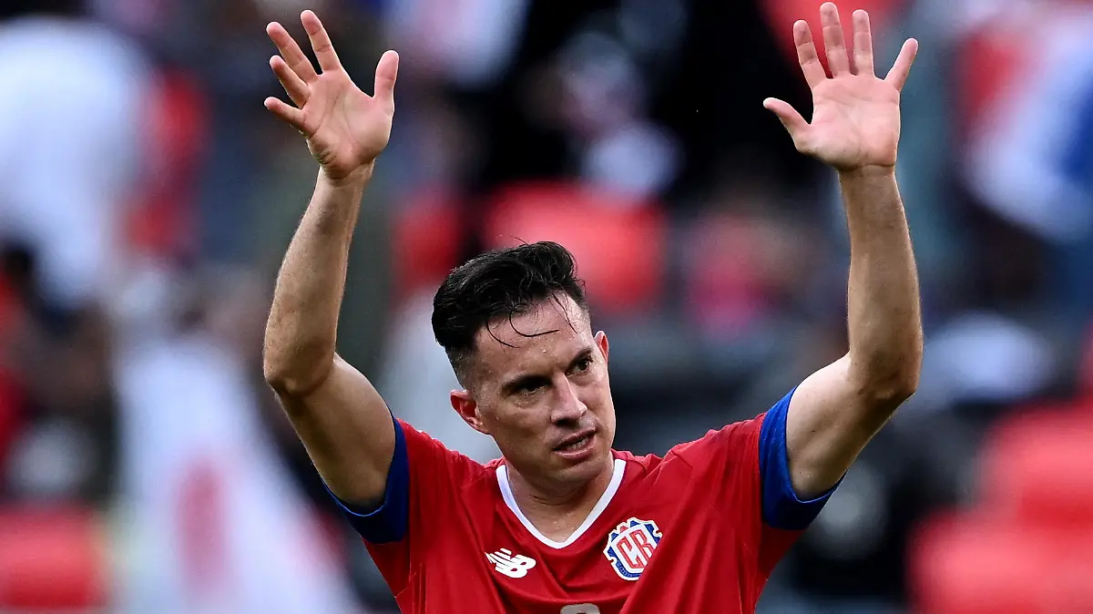 Soccer Football - FIFA World Cup Qatar 2022 - Group E - Japan v Costa Rica - Ahmad Bin Ali Stadium, Al Rayyan, Qatar - November 27, 2022 Costa Rica's Bryan Oviedo celebrates after the match REUTERS/Dylan Martinez