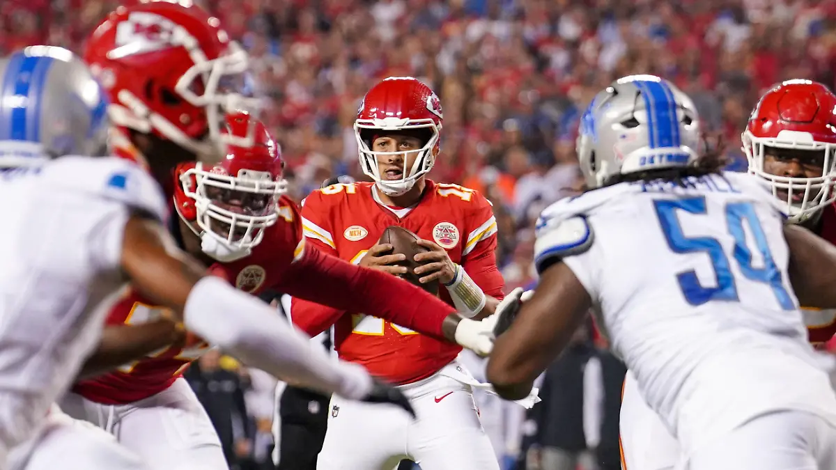 Sep 7, 2023; Kansas City, Missouri, USA; Kansas City Chiefs quarterback Patrick Mahomes (15) drops back to pass against the Detroit Lions during the first half at GEHA Field at Arrowhead Stadium. Mandatory Credit: Denny Medley-USA TODAY Sports