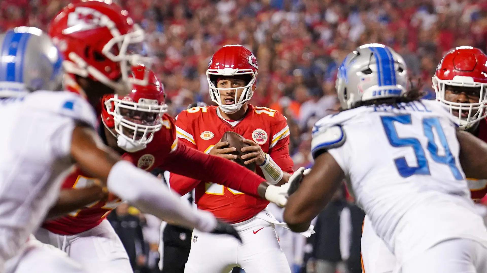 Sep 7, 2023; Kansas City, Missouri, USA; Kansas City Chiefs quarterback Patrick Mahomes (15) drops back to pass against the Detroit Lions during the first half at GEHA Field at Arrowhead Stadium. Mandatory Credit: Denny Medley-USA TODAY Sports