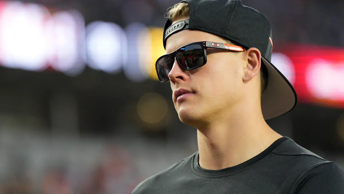 Cincinnati Bengals quarterback Joe Burrow walks on the sideline during the first half of a preseason NFL football game against the Green Bay Packers Friday, Aug. 11, 2023, in Cincinnati. (AP Photo/Jeff Dean)