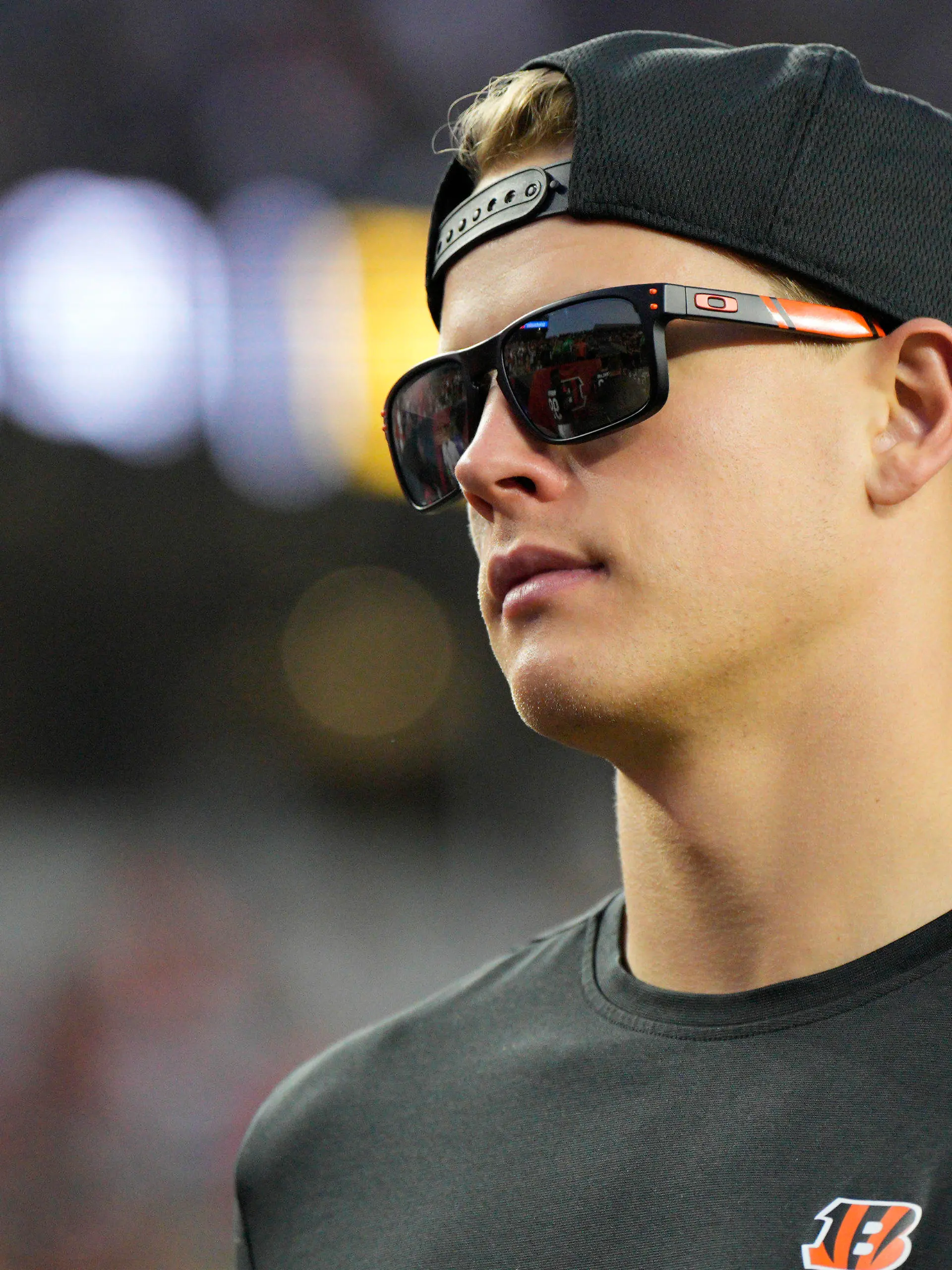 Cincinnati Bengals quarterback Joe Burrow walks on the sideline during the first half of a preseason NFL football game against the Green Bay Packers Friday, Aug. 11, 2023, in Cincinnati. (AP Photo/Jeff Dean)