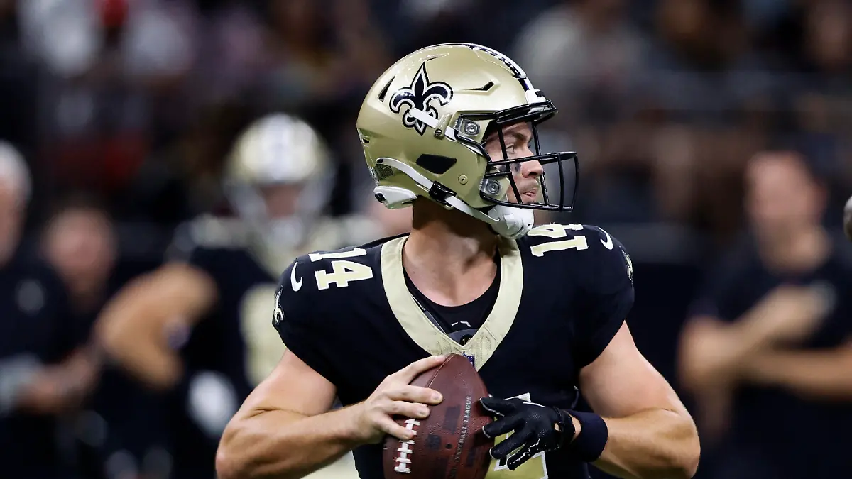New Orleans Saints quarterback Jake Haener throws a pass in the first half of a preseason NFL football game against the Houston Texans, Sunday, Aug. 27, 2023, in New Orleans. (AP Photo/Butch Dill)