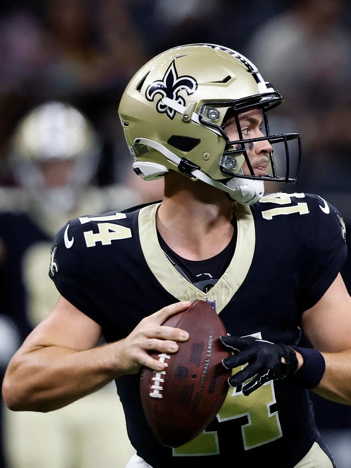 New Orleans Saints quarterback Jake Haener throws a pass in the first half of a preseason NFL football game against the Houston Texans, Sunday, Aug. 27, 2023, in New Orleans. (AP Photo/Butch Dill)