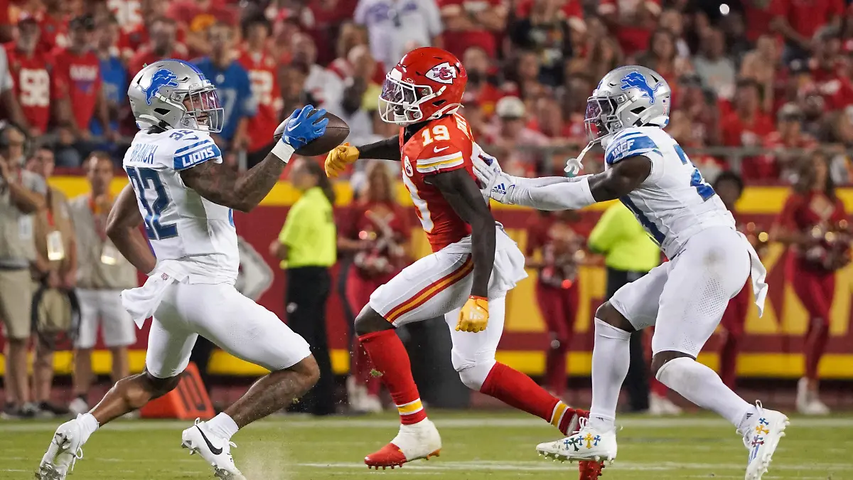 Sep 7, 2023; Kansas City, Missouri, USA; Detroit Lions safety Brian Branch (32) intercepts a pass intended for Kansas City Chiefs wide receiver Kadarius Toney (19) during the second half at GEHA Field at Arrowhead Stadium. Mandatory Credit: Denny Medley-USA TODAY Sports