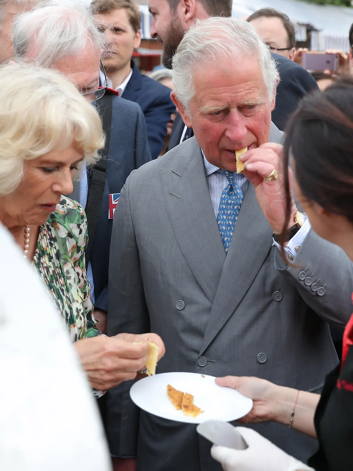 Royal visit to France and Greece - Day Three. The Prince of Wales and the Duchess of Cornwall tour Nice Flower Market, in Nice, France, meeting members of the public as well as stall holders as part of their visit to the country. Picture date: Wednesday May 9, 2018. See PA story ROYAL Charles. Photo credit should read: Andrew Matthews/PA Wire URN:36395477
