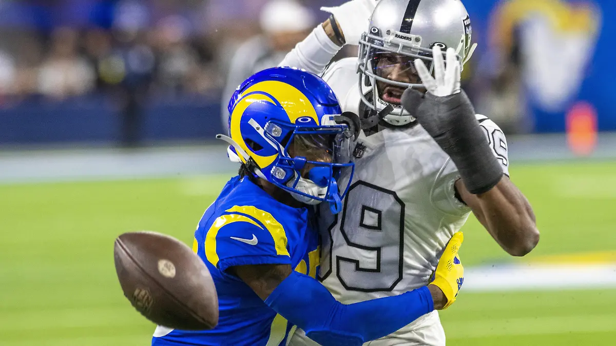 Los Angeles Rams wide receiver Tutu Atwell (15) gets called for offensive pass interference on Las Vegas Raiders cornerback Nate Hobbs (39) during the first half of a game between the Los Angeles Rams and the Las Vegas Raiders at SoFi Stadium in Inglewood CA, Thursday December 8, 2022. Photo by Mike Goulding/UPI Photo via Newscom picture alliance