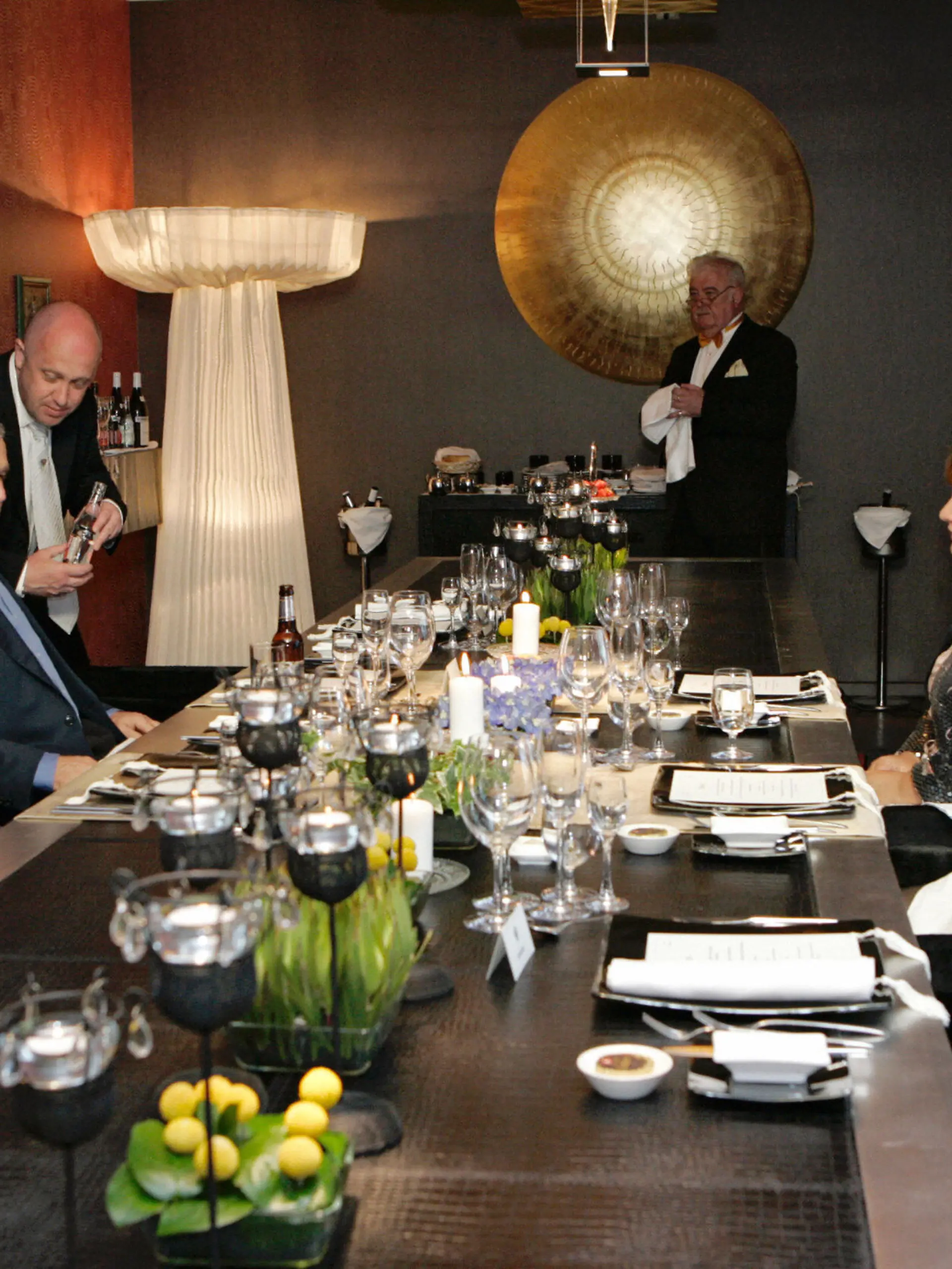ST.PETERSBURG, RUSSIAN FEDERATION: Russian President Vladimir Putin (R), his wife Ludmila (2ndR), US President George W. Bush (2ndL) and his wife Laura attend a dinner, 14 July 2006, in Strelna outside St. Petersburg. US and Russian negotiators sought 14 July to overcome lingering obstacles to a deal on Moscow's admission to the WTO that Russian officials are eager to announce at the weekend G8 summit. AFP PHOTO/ DMITRY ASTAKHOV / G8 SUMMIT (Photo credit should read DMITRY ASTAKHOV/AFP via Getty Images)
