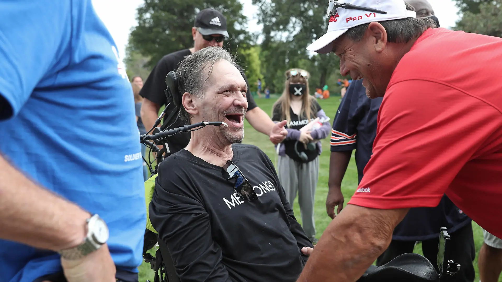 September 18, 2021, Chicago, IL: Former Chicago Bears players Steve McMichael, middle, and Dan Hampton, right, laugh as they greet each other before the ALS Walk For Life at Soldier Field on Saturday, Sept. 18, 2021, in Chicago. McMichael, who was diagnosed with ALS, received the Les Turner ALS Foundation Courage Award during the opening ceremony. Chicago - ZUMAm67_ 20210918_zaf_m67_018 Copyright: xJohnxJ.xKimx