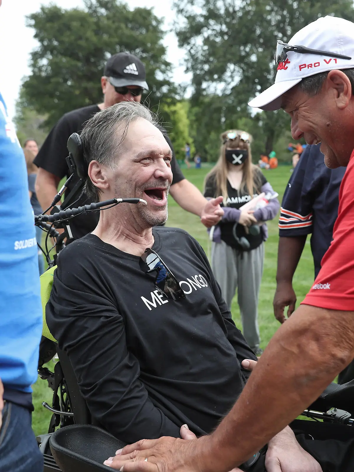 September 18, 2021, Chicago, IL: Former Chicago Bears players Steve McMichael, middle, and Dan Hampton, right, laugh as they greet each other before the ALS Walk For Life at Soldier Field on Saturday, Sept. 18, 2021, in Chicago. McMichael, who was diagnosed with ALS, received the Les Turner ALS Foundation Courage Award during the opening ceremony. Chicago - ZUMAm67_ 20210918_zaf_m67_018 Copyright: xJohnxJ.xKimx 