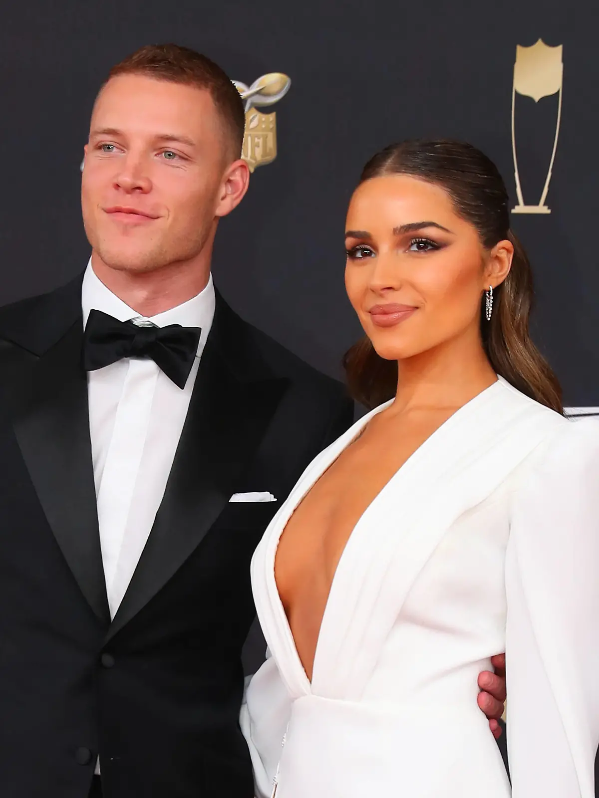 MIAMI, FL - FEBRUARY 01: Carolina Panthers running back Christian McCaffrey and Olivia Culpo pose on the Red Carpet poses prior to the NFL, American Football Herren, USA Honors on February 1, 2020 at the Adrienne Arsht Center in Miami, FL. Photo by Rich Graessle/PPI/Icon Sportswire NFL: FEB 01 NFL Honors Red Carpet Icon200201279