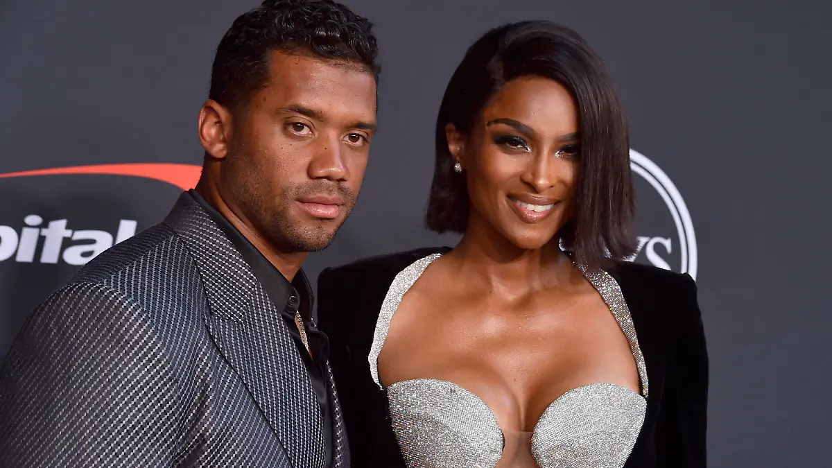 FILE - NFL player Russell Wilson of the Denver Broncos, left, and Ciara arrive at the ESPY Awards on Wednesday, July 20, 2022, at the Dolby Theatre in Los Angeles. The Grammy-award winning performer Ciara is expecting her fourth child, her third with husband and Denver Broncos quarterback Russell Wilson. (Photo by Jordan Strauss/Invision/AP, File)