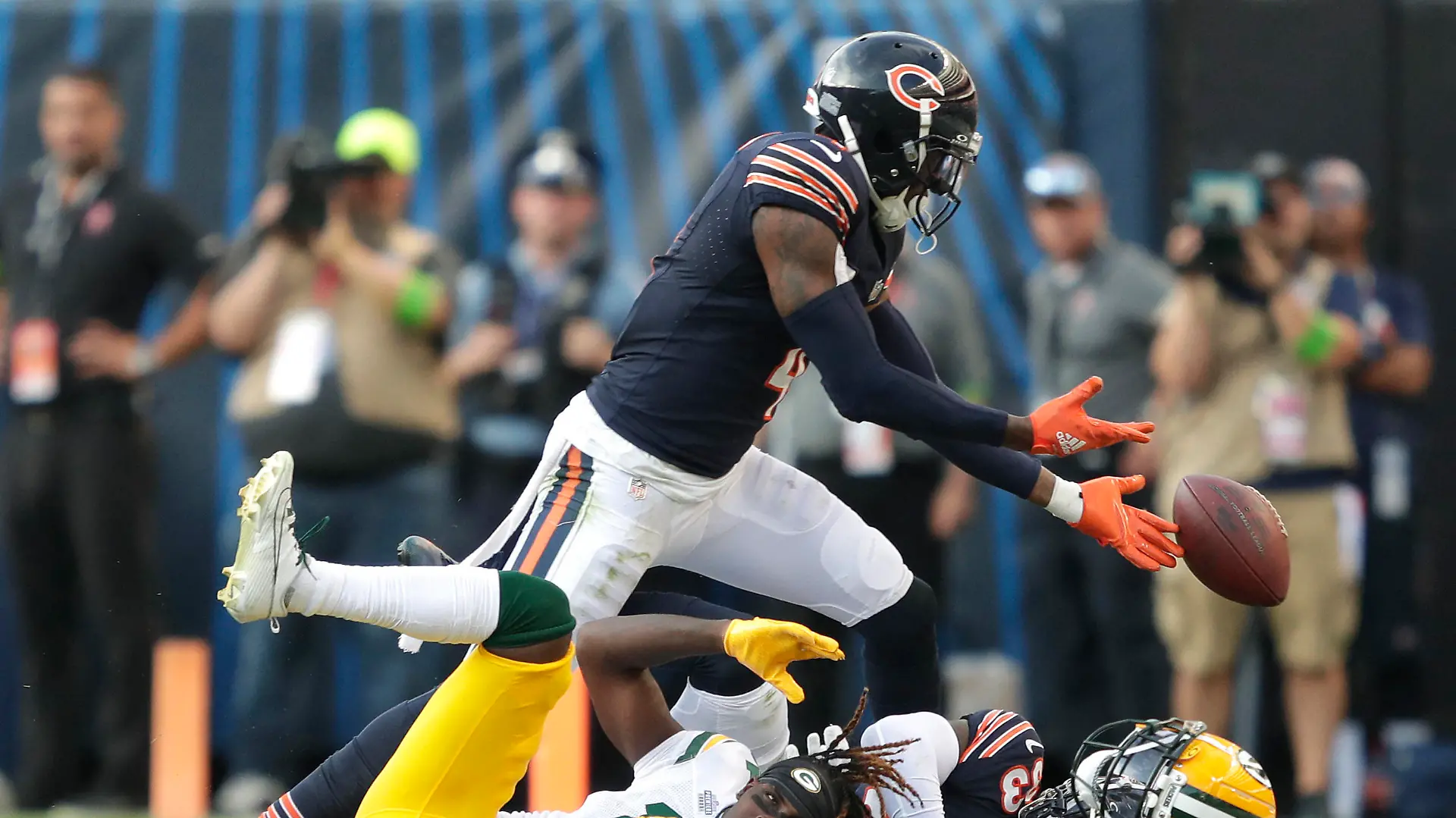 Sep 10, 2023; Chicago, Illinois, USA; Green Bay Packers wide receiver Jayden Reed (11) loses his helmet as Chicago Bears safety Eddie Jackson (4) and cornerback Jaylon Johnson (33) defend to force an incompleted pass during their football game at Soldier Field. Mandatory Credit: Dan Powers-USA TODAY Sports