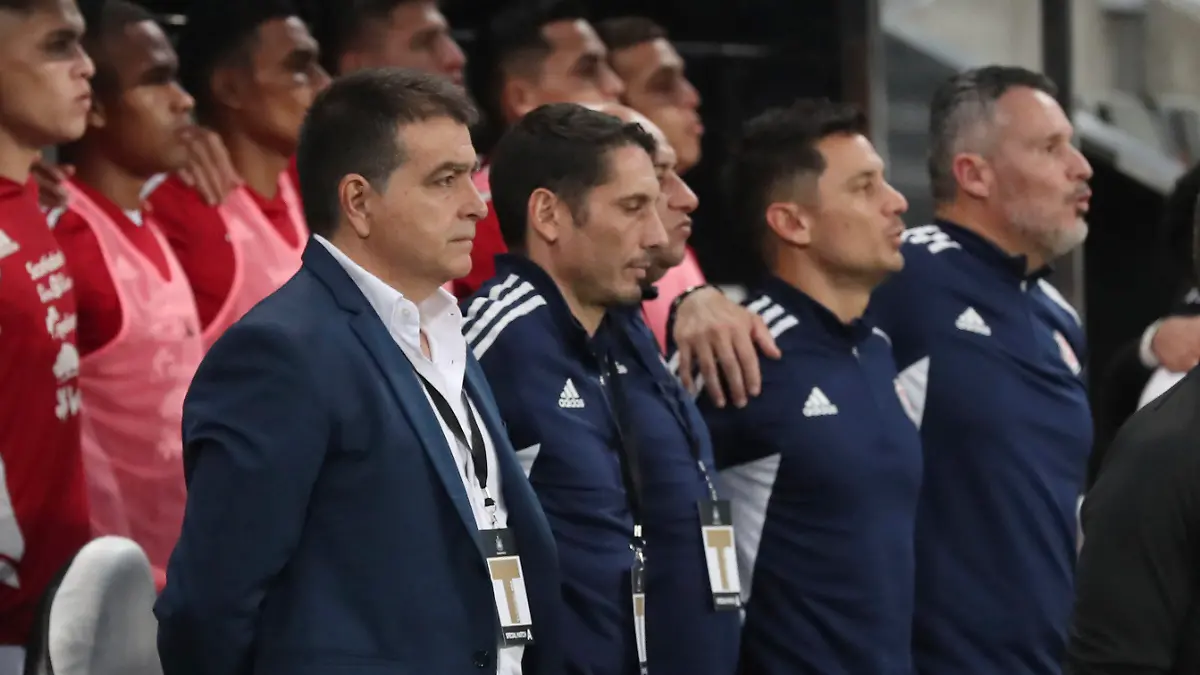 Costa Rica manager Claudio Vivas, left, stands with his team before an international friendly soccer match between Costa Rica and Saudi Arabia at St. James' Park, Friday, Sept. 8, 2023, in Newcastle, England. (AP Photo/Scott Heppell)