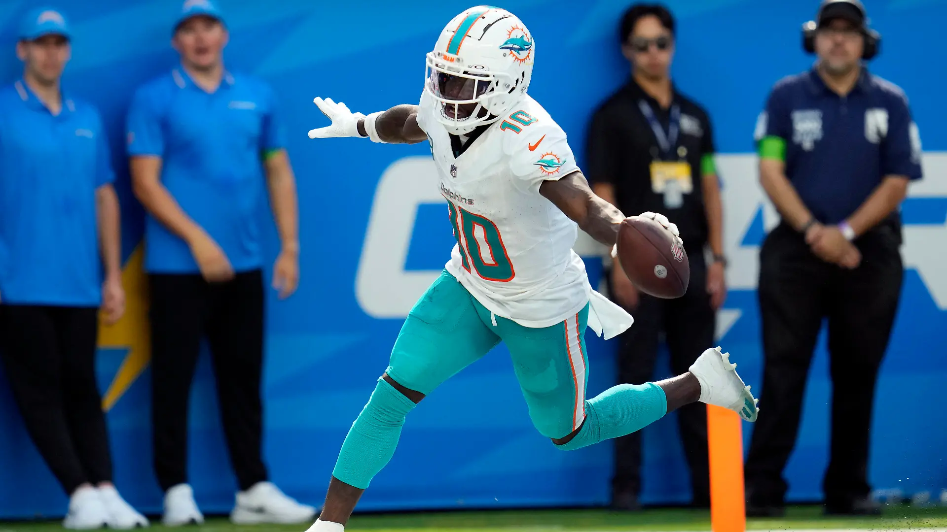 Miami Dolphins wide receiver Tyreek Hill celebrates his touchdown catch during the second half of an NFL football game against the Los Angeles Chargers Sunday, Sept. 10, 2023, in Inglewood, Calif. (AP Photo/Ashley Landis)