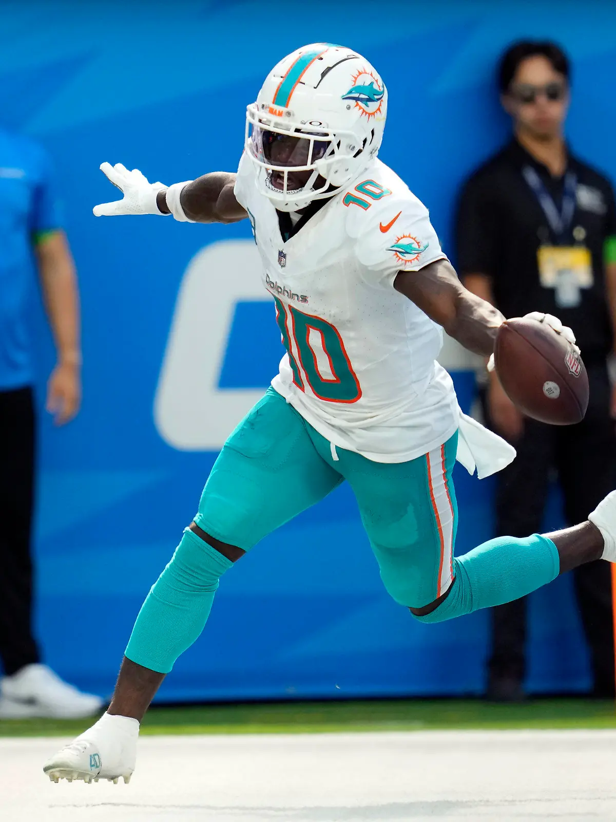 Miami Dolphins wide receiver Tyreek Hill celebrates his touchdown catch during the second half of an NFL football game against the Los Angeles Chargers Sunday, Sept. 10, 2023, in Inglewood, Calif. (AP Photo/Ashley Landis)