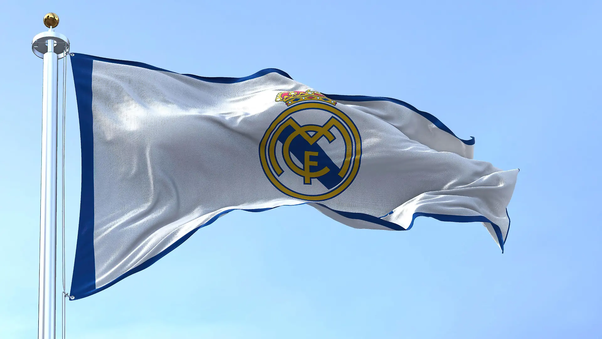 The Flag of Real Madrid waving in the wind on a clear day, Madrid, Spain, June 2022: The Flag of Real Madrid waving in the wind on a clear day. Real Madrid is a Spanish professional football club based in Madrid, Madrid, Spain, June 2022: The Flag of Real Madrid waving in the wind on a clear day. Real Madrid is a Spanish professional football club based in Madrid, 07.09.2022, Copyright: xrarrarorrox Panthermedia31820078.jpg