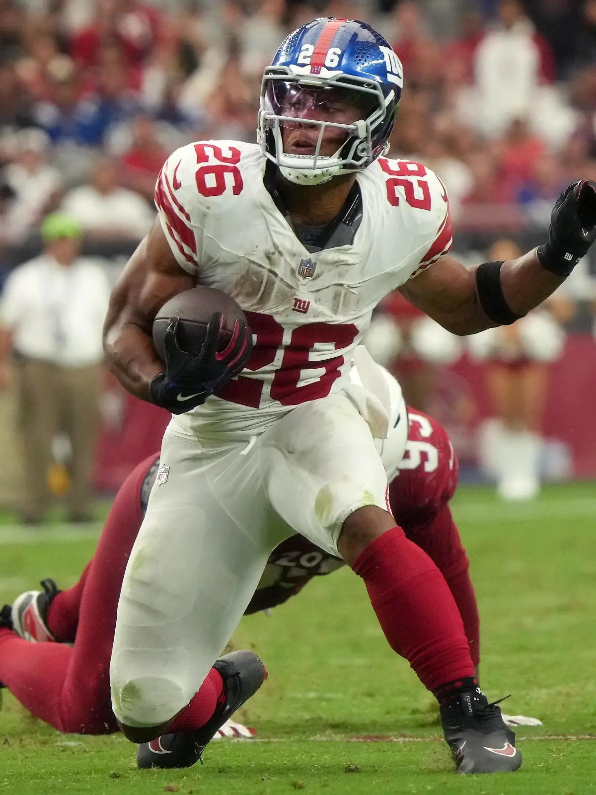 Syndication: Arizona Republic New York Giants running back Saquon Barkley 26 runs the ball against the Arizona Cardinals at State Farm Stadium in Glendale on Sept. 17, 2023. , EDITORIAL USE ONLY PUBLICATIONxINxGERxSUIxAUTxONLY Copyright: xJoexRondone/ThexRepublicx 21446496