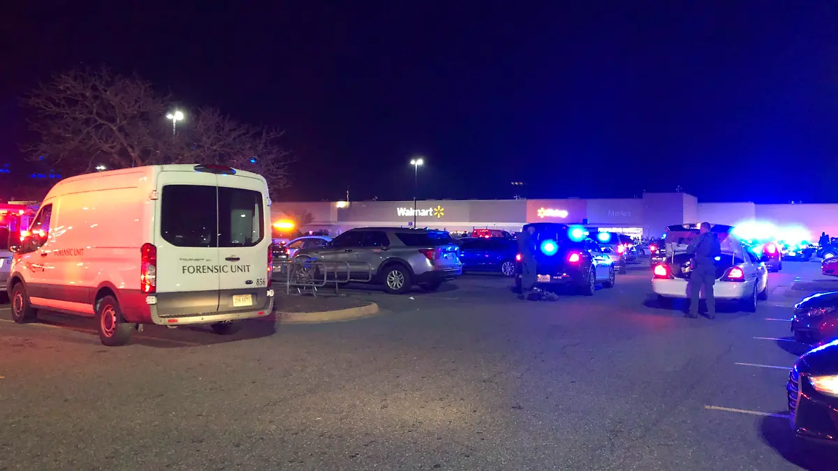 In this image from video police respond to the scene of a fatal shooting at a Walmart on Tuesday night, Nov. 22, 2022, in Chesapeake, Va. (WAVY-TV 10 via AP)
