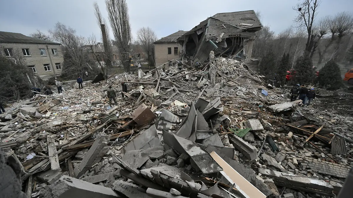 Rescuers work at the site of a maternity ward of a hospital destroyed by a Russian missile attack, as their attack on Ukraine continues, in Vilniansk, Zaporizhzhia region, Ukraine November 23, 2022. REUTERS/Stringer