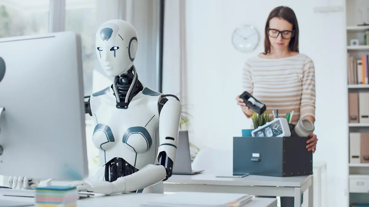 Disappointed businesswoman packing her belongings and leaving the office: the impact of AI on employment