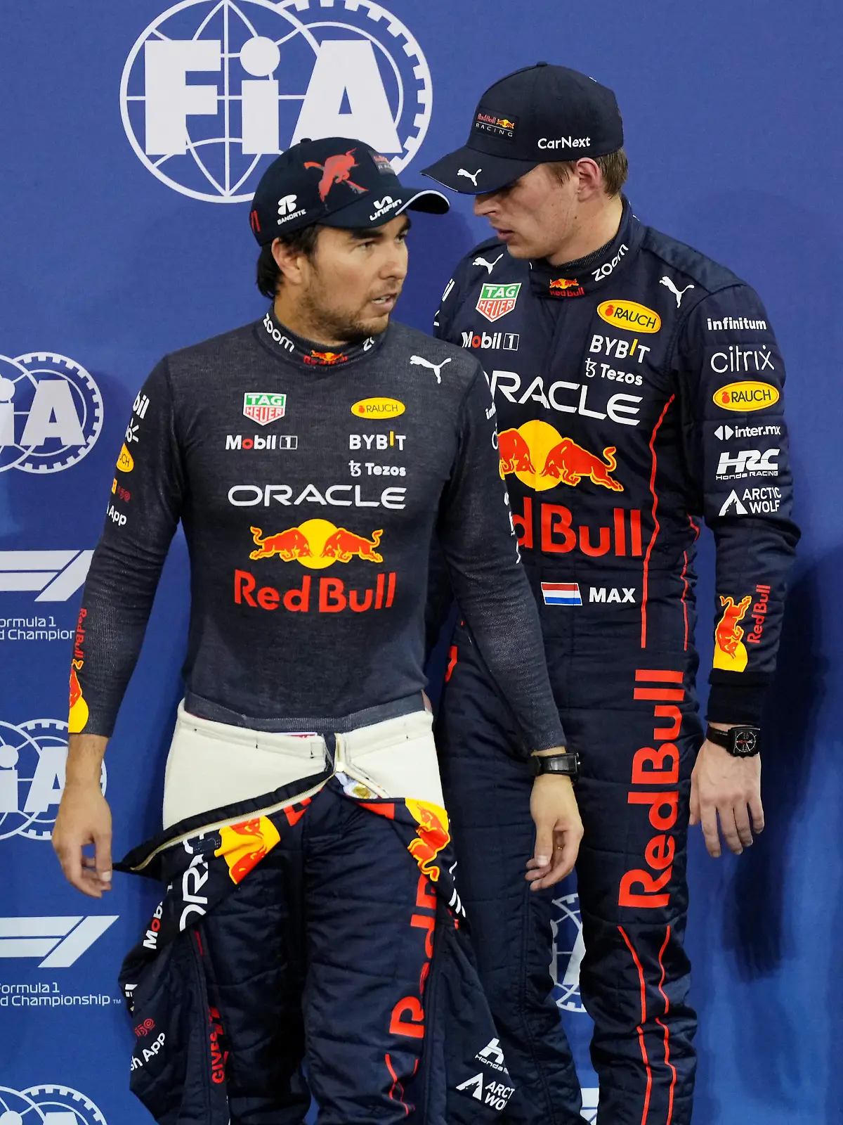 Formula One F1 - Abu Dhabi Grand Prix - Yas Marina Circuit, Abu Dhabi, United Arab Emirates - November 19, 2022 Red Bull's Max Verstappen celebrates after qualifying in pole position with second placed Red Bull's Sergio Perez REUTERS/Aleksandra Szmigiel