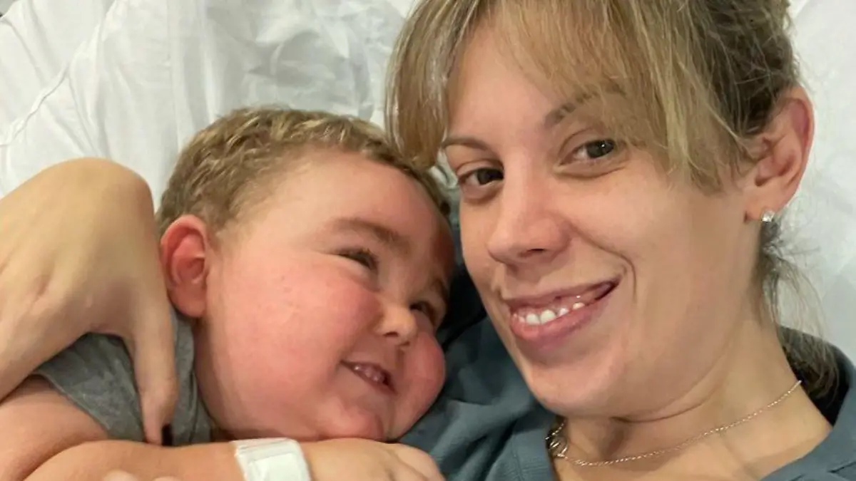 Story from Jam Press (Overweight Cancer)
Pictured: Morgan and his mum, Natalie.
'Doctors said my two-year-old son was just overweight – he was actually battling rare CANCER' reveals mum, 32
A mum has shared how her toddler's sudden weight gain and excessive body hair were actually symptoms of cancer – claiming doctors insisted he was just "overweight".
Natalie Ridler, 32, a physiotherapist from Swansea, was left heartbroken after her two-year-old son, Morgan, was unexpectedly diagnosed with cancer in October 2021.
The toddler had begun gaining weight rapidly in April and developed excessive body hair and behavioural issues.
Concerned, the mum took her son to the doctor, but claims they accused her of overfeeding her child.
After pushing for tests, it was discovered he suffered from a tumour on his adrenal gland, known as adrenocorticol carcinoma.
Poor Morgan was given a 10% chance of survival, with the illness affecting one in every million children.
"We thought we were going to lose our son because it had taken so long to get him diagnosed," Natalie told NeedToKnow.Online.
"I was angry that I hadn’t pushed harder sooner.
"I was concerned about perhaps, an endocrine disorder or hormone disorder, but I never thought it was going to be cancer.
"At first it was terrifying, I have a medical background in my job so I understood an awful lot of what was happening and going on.
"My husband, Matthew, 32, didn’t have that so I think everything was a lot scarier for him.
"The fear that we would lose his firstborn and his only son was something he couldn’t comprehend but couldn’t stop thinking about.
"He really struggled to compartmentalise and suffered from PTSD as a result.
"It was really tough on him as he had to return to work during Morgan’s treatment as we couldn’t sustain ourselves on two lots of sick pay."
Weeks prior to her son's diagnosis, the mum-of-two decided to seek a private consultation as she knew her boy wasn't just "ove