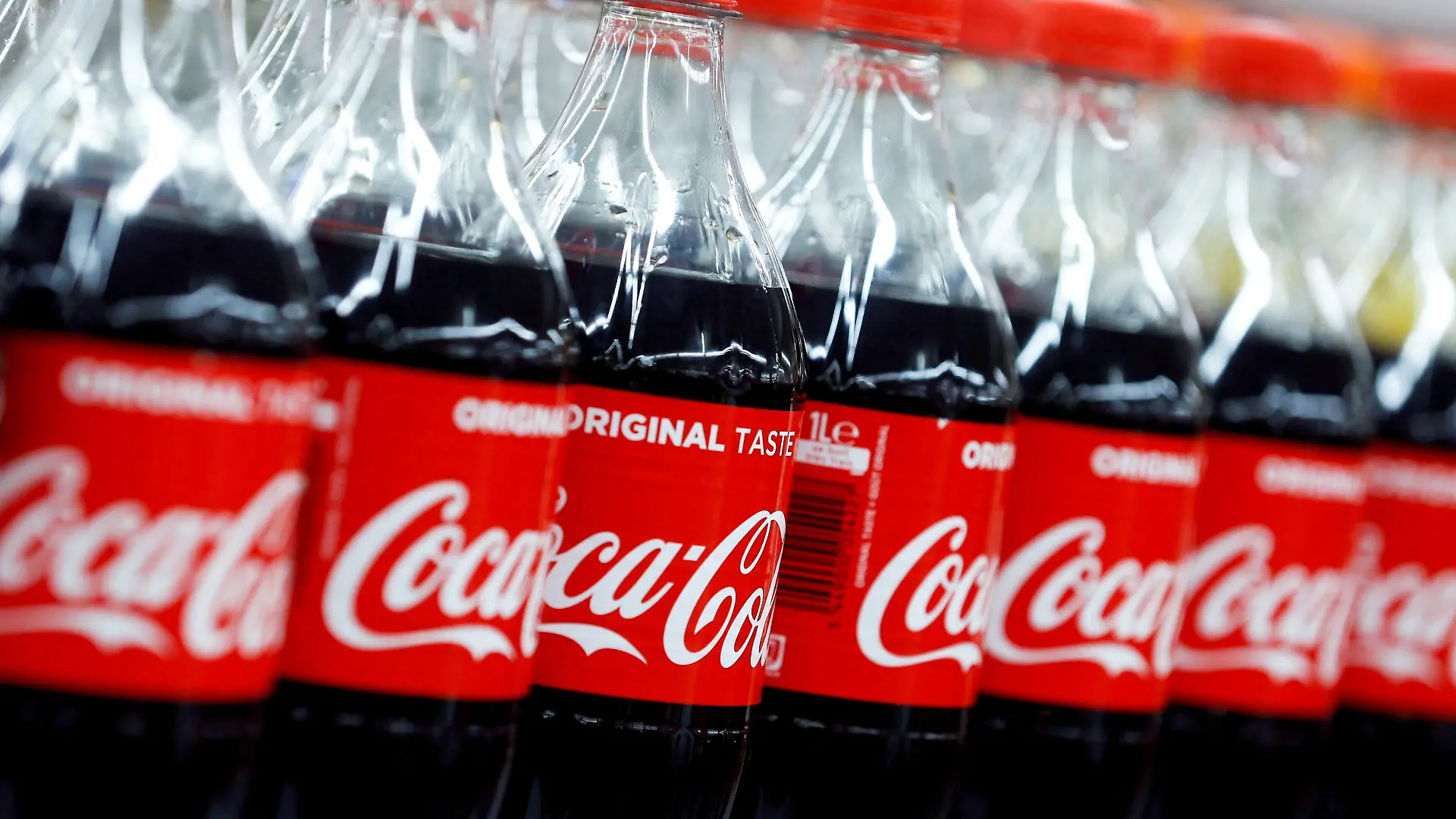 FILE PHOTO: Bottles of Coca-Cola are seen at a Carrefour Hypermarket store in Montreuil, near Paris, France, February 5, 2018. REUTERS/Regis Duvignau/File Photo GLOBAL BUSINESS WEEK AHEAD/File Photo