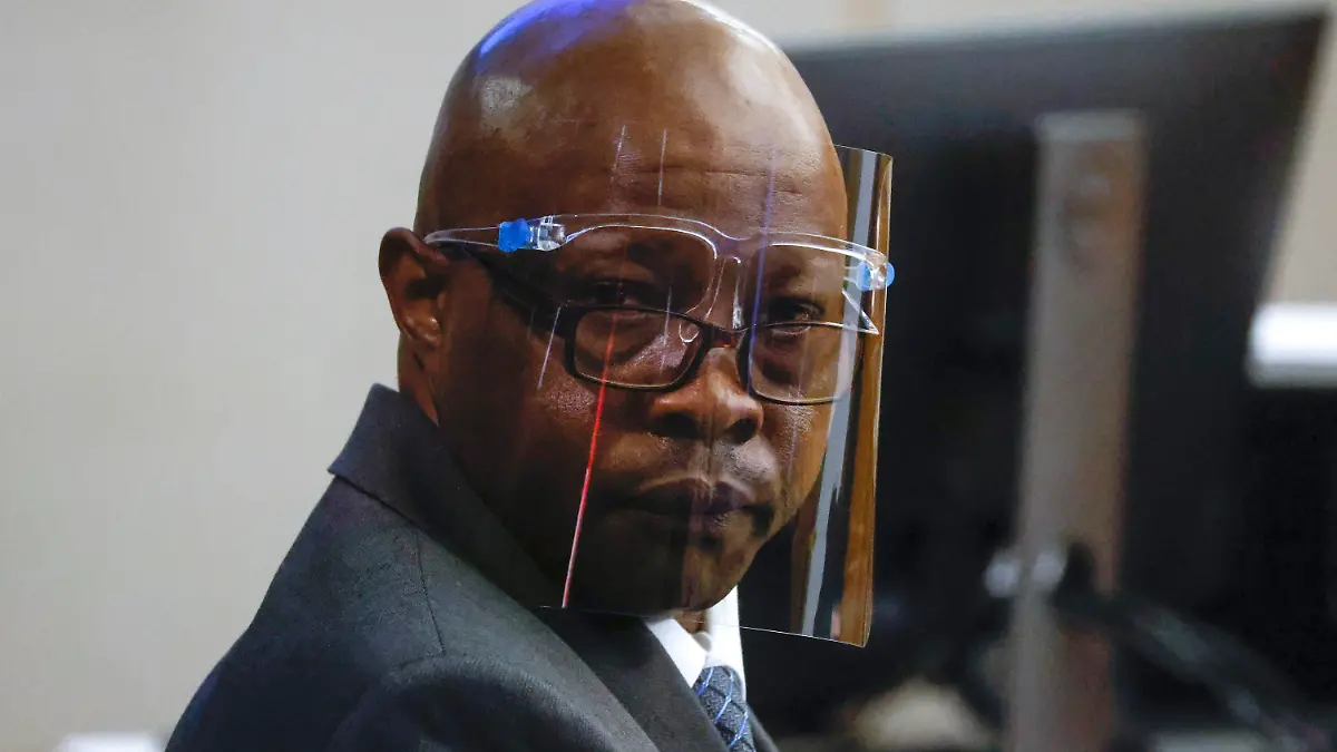 FILE - Accused serial killer Billy Chemirmir looks back ahead of his third trial at Frank Crowley Courts Building, Oct. 3, 2022, in Dallas. Chemirmir, who was accused of killing nearly two dozen older women and convicted in 2022 in the slayings of two, was killed Tuesday morning, Sept. 19, 2023, by his cellmate at a Texas prison, an official said. (Shafkat Anowar/The Dallas Morning News via AP, File)