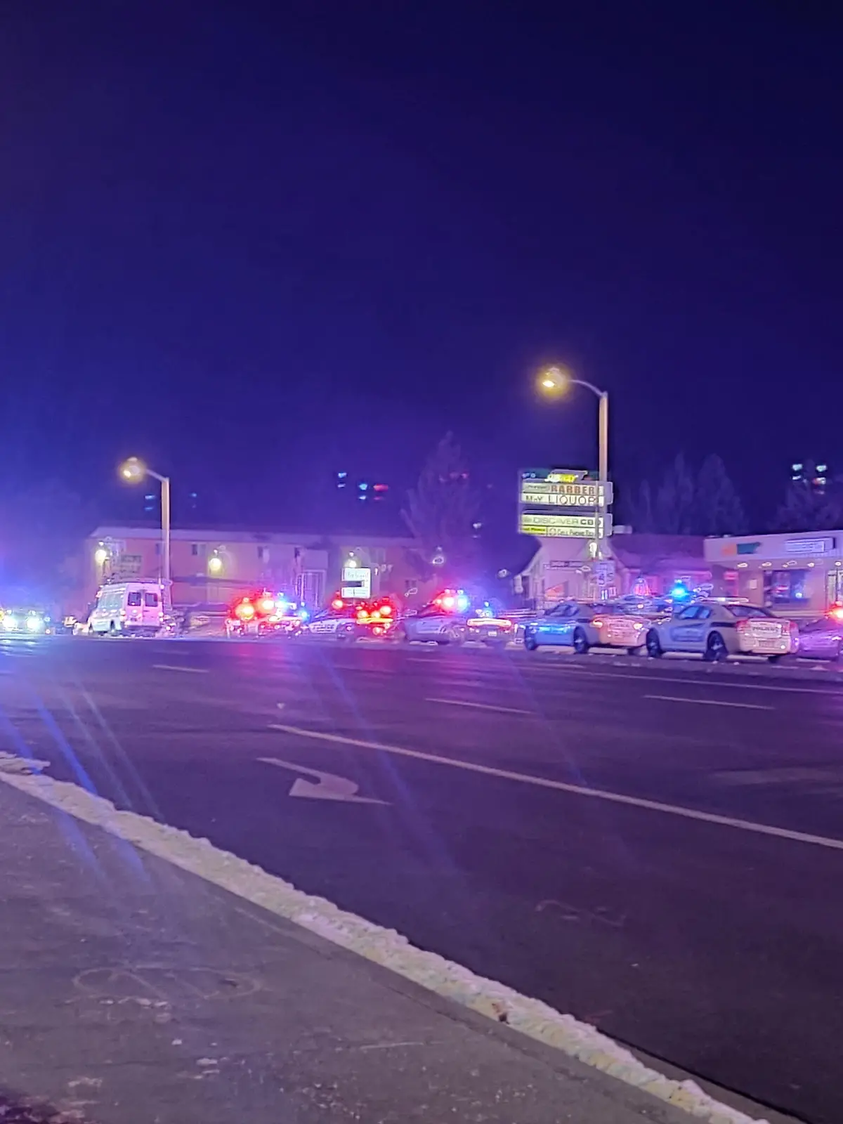A view of various security and emergency vehicles with flashing blinkers parked on a street, after a shooting in a club, in Colarado Springs, Colorado, U.S November 20, 2022, in this picture obtained from social media. in this picture obtained from social media. Trey Deabueno/TWITTER @TREYRUFFY/via REUTERS  THIS IMAGE HAS BEEN SUPPLIED BY A THIRD PARTY. MANDATORY CREDIT. NO RESALES. NO ARCHIVES.