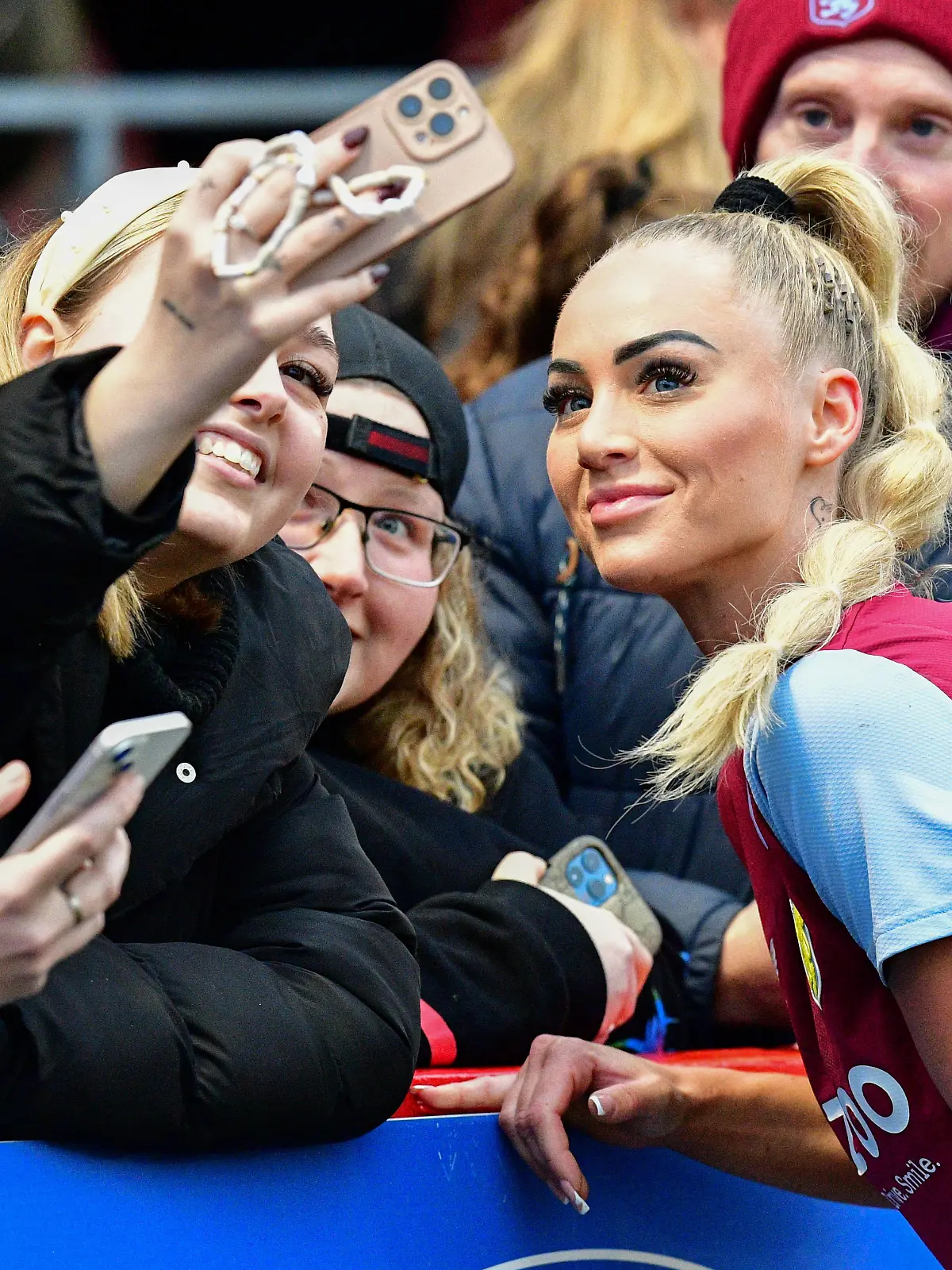 Alisha Lehmann of Aston Villa has a selfie with some Villa fans following the FA Women s Super League match between Brighton & Hove Albion Women and Aston Villa at The People s Pension Stadium on February 12th 2023 in Crawley, United Kingdom Where: Crawley, West Sussex, United Kingdom When: 12 Feb 2023 Credit: Jeff Mood/phcimages/Cover Images **NOT AVAILABLE FOR PUBLICATION IN UK NEWSPAPERS** PUBLICATIONxNOTxINxUKxFRA Copyright: xJeffxMood/phcimages/CoverxImagesx 52437444