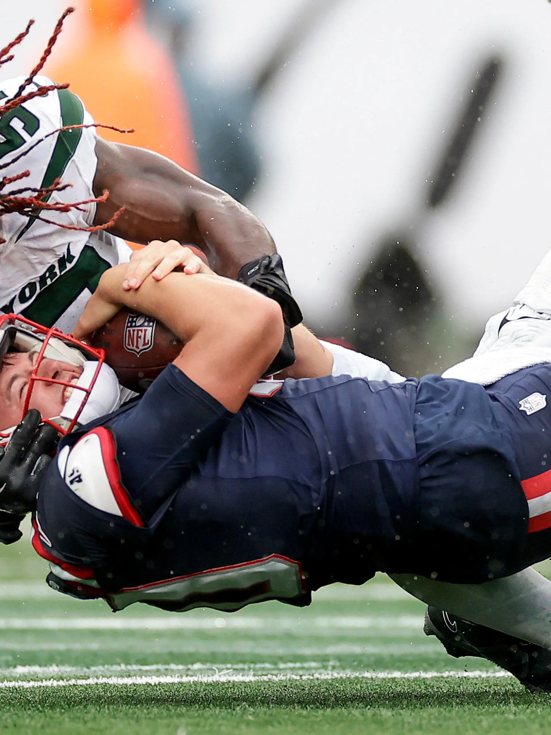 New England Patriots quarterback Mac Jones (10) is sacked by New York Jets linebacker C.J. Mosley (57) during the fourth quarter of an NFL football game, Sunday, Sept. 24, 2023, in East Rutherford, N.J. (AP Photo/Adam Hunger)