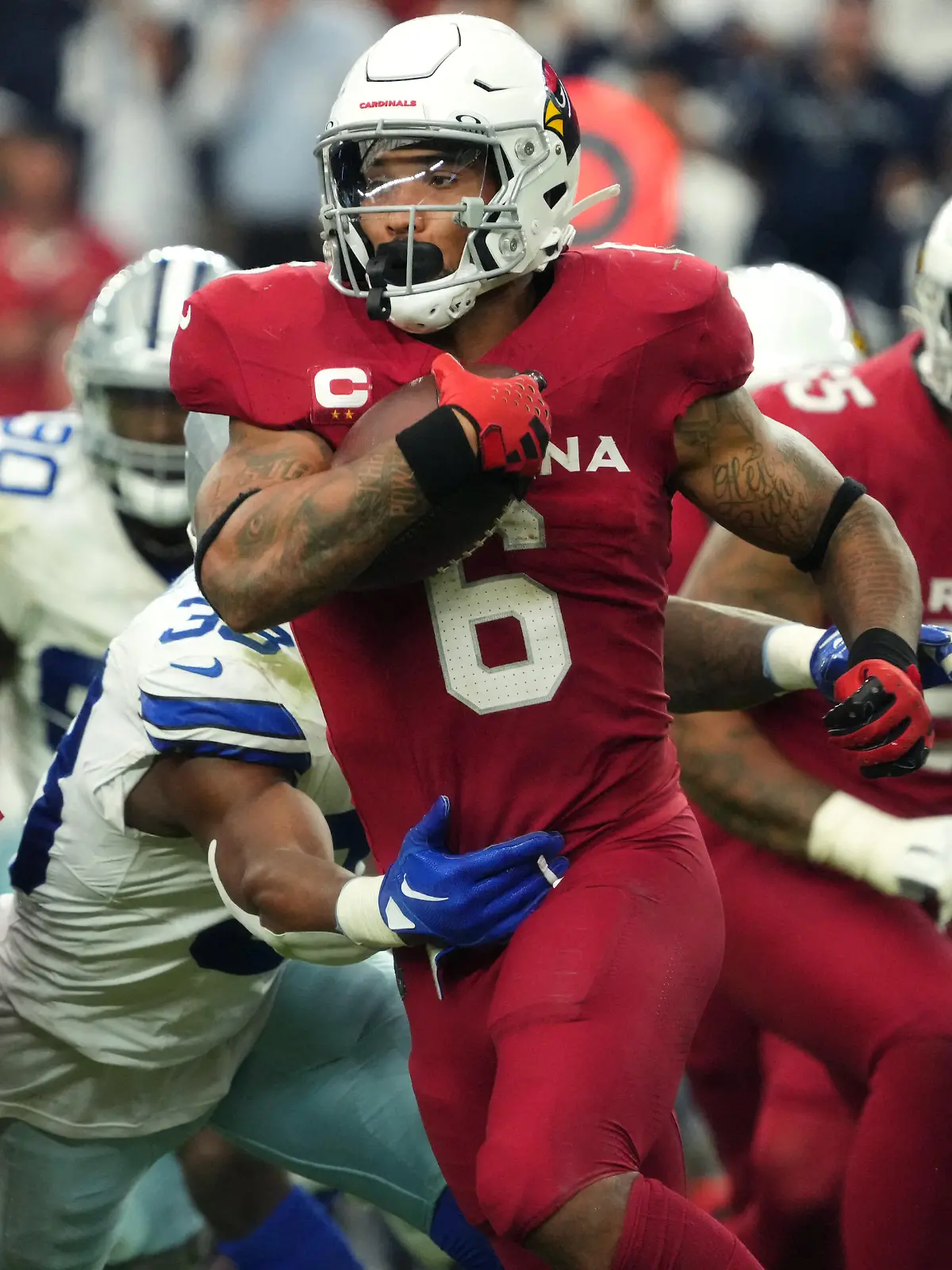 Sep 24, 2023; Glendale, Arizona, United States; Arizona Cardinals running back James Conner (6) carries the ball against the Dallas Cowboys at State Farm Stadium. Mandatory Credit: Joe Rondone-USA TODAY Sports