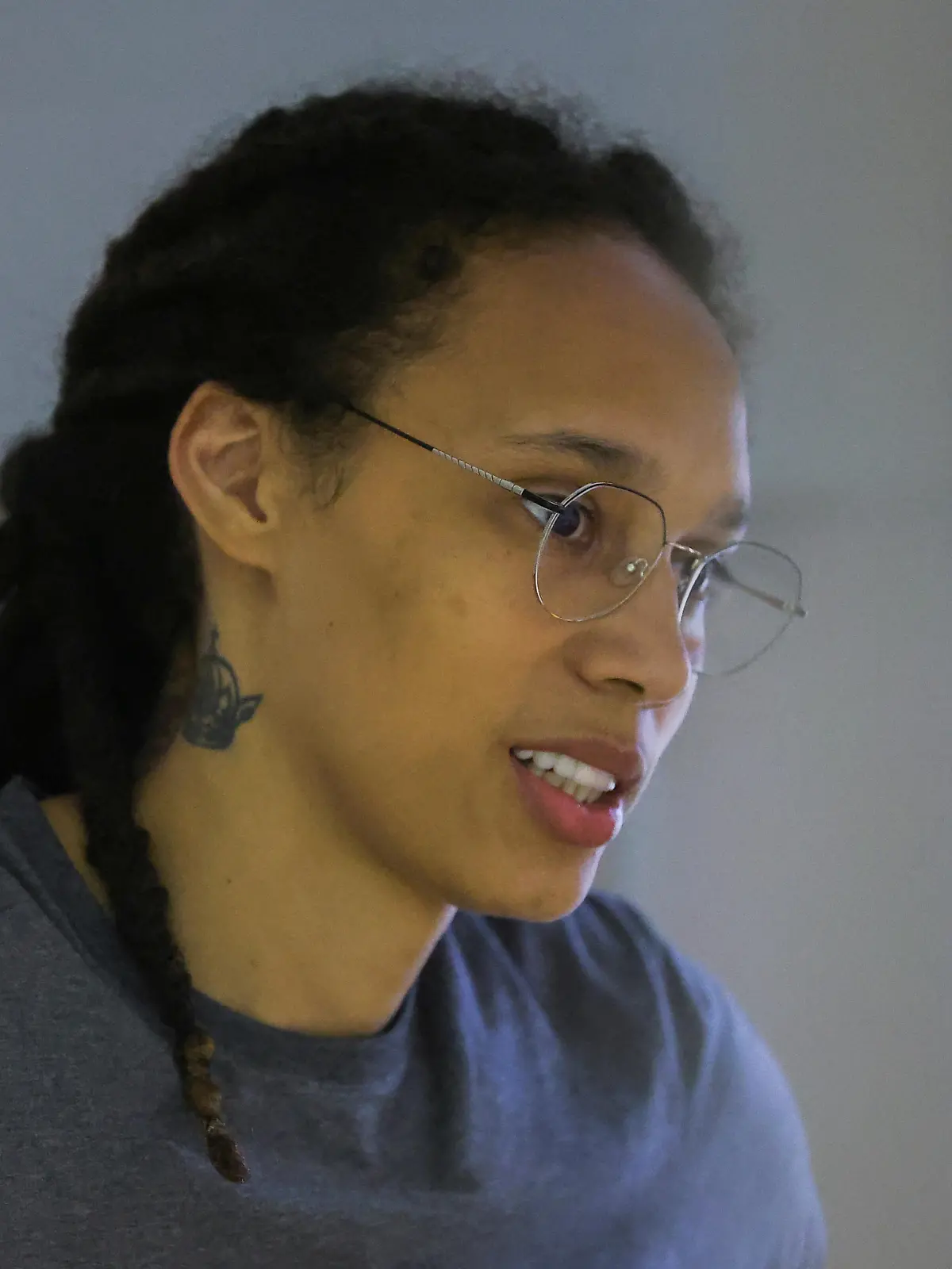 FILE PHOTO: U.S. basketball player Brittney Griner, who was detained at Moscow's Sheremetyevo airport and later charged with illegal possession of cannabis, stands inside a defendants' cage during the reading of the court's verdict in Khimki outside Moscow, Russia August 4, 2022. REUTERS/Evgenia Novozhenina/Pool/File Photo