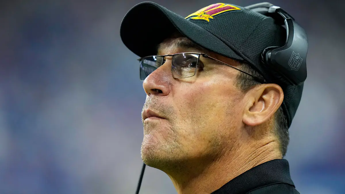 Washington Commanders head coach Ron Rivera checks the replay screen in the second half of an NFL football game against the Indianapolis Colts in Indianapolis, Fla., Sunday, Oct. 30, 2022. (AP Photo/AJ Mast)