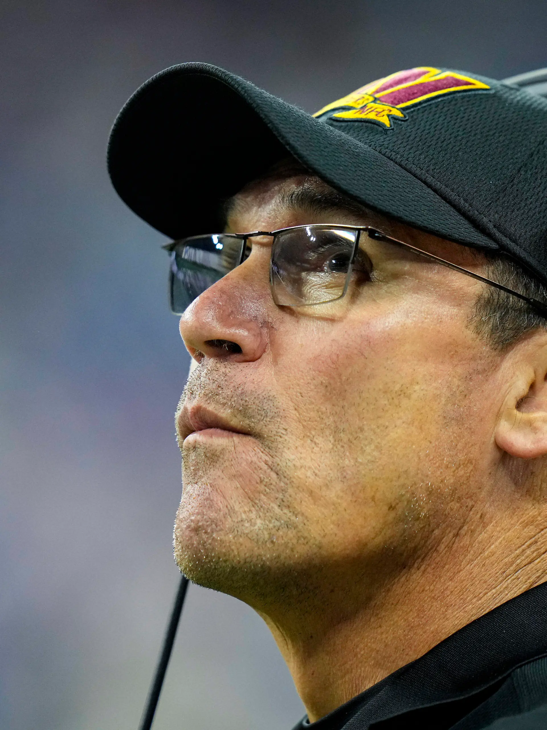 Washington Commanders head coach Ron Rivera checks the replay screen in the second half of an NFL football game against the Indianapolis Colts in Indianapolis, Fla., Sunday, Oct. 30, 2022. (AP Photo/AJ Mast)