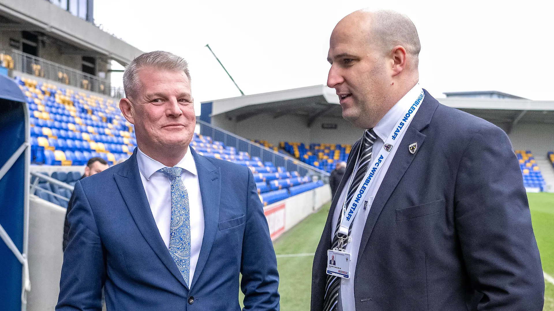 White Paper on football governance Sports Minister Stuart Andrew left speaks with AFC Wimbledon managing director Danny Macklin during a DCMS media event at Cherry Red Records Stadium, home of AFC Wimbledon. A new White Paper on football governance published on Thursday sets out the proposed scope of the new regulators powers.Clubs will be required to adhere to minimum standards on fan engagement as part of a licensing system overseen by the regulator, forcing them to abide by Football Association rules giving fans veto powers over changes of a clubs name, badge and kit colour. Picture date: Thursday February 23, 2023. Use subject to restrictions. Editorial use only, no commercial use without prior consent from rights holder. PUBLICATIONxNOTxINxUKxIRL Copyright: xJeffxMoorex 71104419